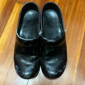 Shiny black Dansko clogs